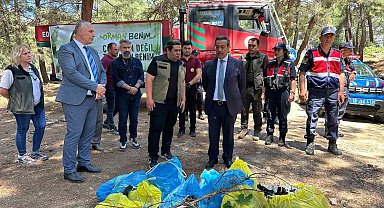 Burhaniye'de orman yangınlarına karşı ormanda çöp toplama etkinliği yapıldı