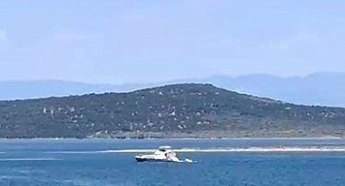 Ayvalık'ta denizde kaybolan genç için arama kurtarma çalışmaları sürüyor
