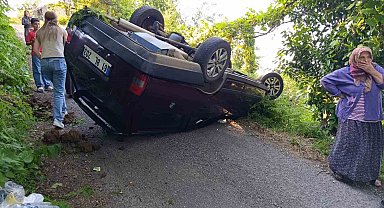 Rampada geri kayan otomobil takla attı: 4 yaralı