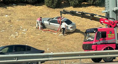 Bursa'da otomobil bariyerleri aşarak tarlaya uçtu