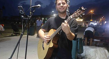 Gündüzleri elektrik tesisatı döşüyor, geceleri gitar çalıyor