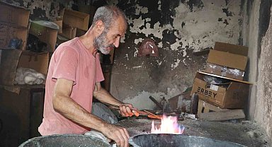 Hem kalaycı hem şair