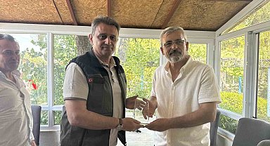 Kızılinler yangın timine teşekkür plaketi