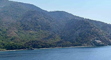 Marmaris'te yangın bölgesinde yeniden alevlenmelere karşı yoğun mesai