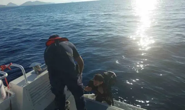 Yüzerek Yunanistan'a geçmeye çalıştı