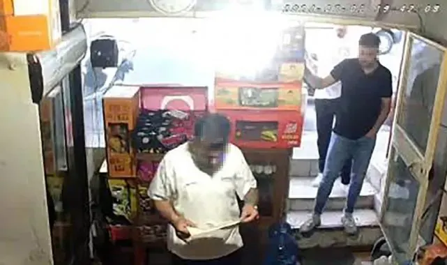 Ümraniye'de dükkanlardan vergi levhası parası isteyen şahıslar yakalandı