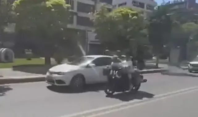 Motosiklete ters oturarak yaptıkları kasksız yolculuk 'pes' dedirtti
