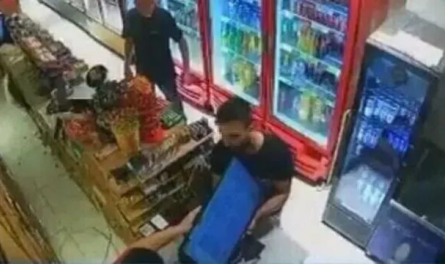 'Alacağım var' diyerek marketteki oyun makinesini götürmeye çalıştı