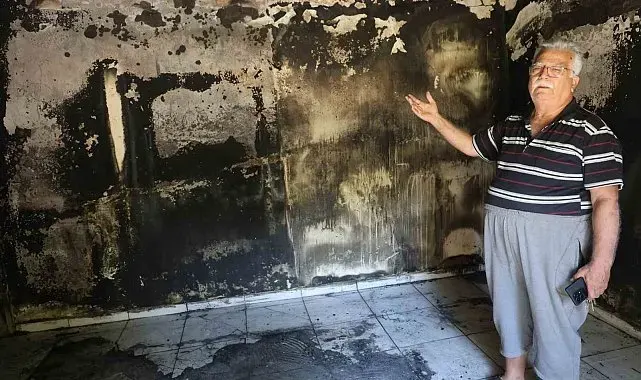 Yaşlı çiftin alevlere teslim olan 40 yıllık evlerinden geriye camı renklendiren çiçekleri kaldı