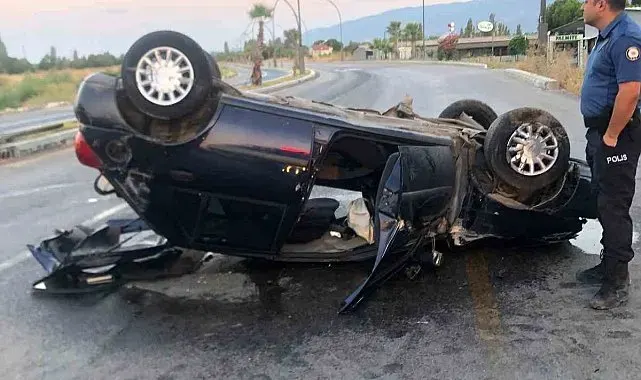 Ters dönen otomobildeki sürücü, sıkıştığı yerden kurtarıldı