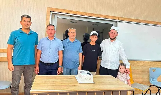Burhaniye'de İmam Hatip Ortaokulu Kur'an Kursu ilk meyvesini verdi.