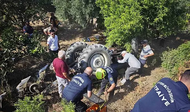Traktörün altında kalan şahıs, ekiplerin çalışmasıyla kurtarıldı