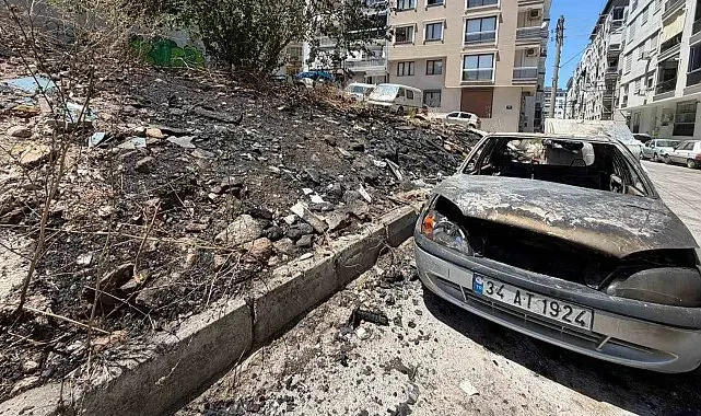 Çöplük alanda çıkan yangın otomobili küle çevirdi