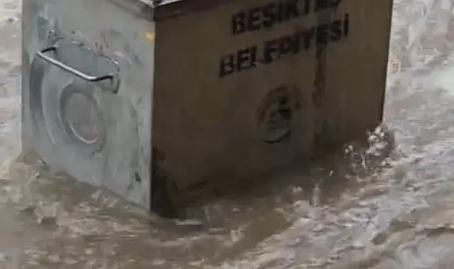 Beşiktaş'ta göle dönen yolda çöp konteyneri böyle sürüklendi