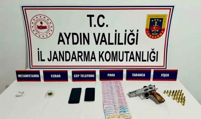 Kuşadası'nda ruhsatsız tabanca ve uyuşturucu ele geçirildi