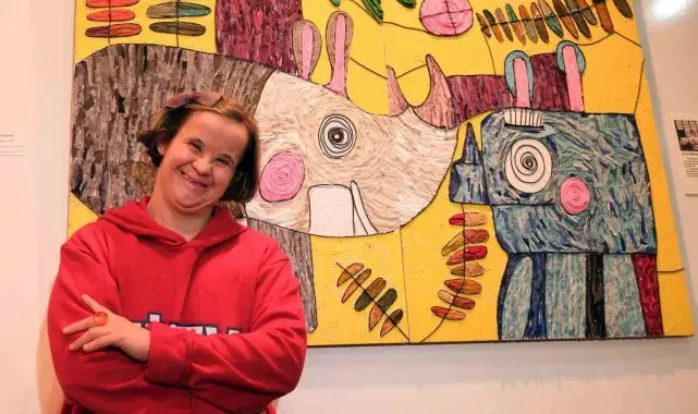 Down sendromlu ressam kalbindekileri tuvale aktarıyor