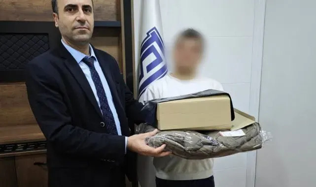 Cizre'de hükümlü ve ailelerine kıyafet ile gıda yardımı